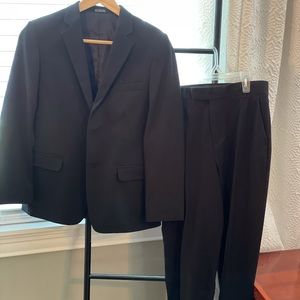 Boys black suit. Calvin Klein jacket 16, pants 14